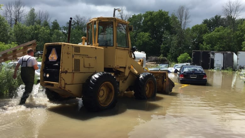 Intense rain floods basements, streets, fields in North Gower