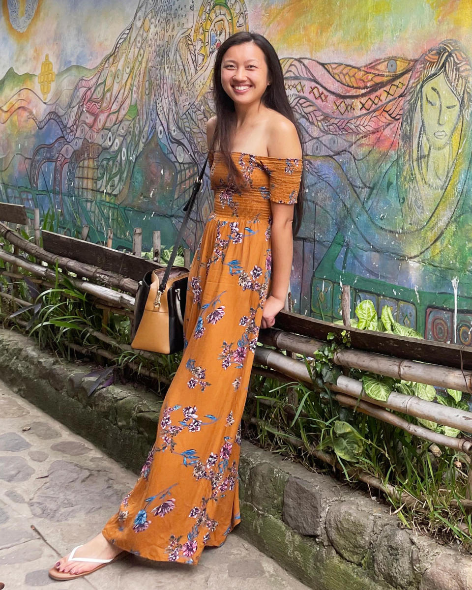 Nancy Ng poses for a photo in front of a mural in Guatemala. (Family photo)