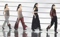 Models wear creations for the Chanel fashion collection during Women's fashion week Fall/Winter 2020/21 presented in Paris, Tuesday, March 3, 2020. (Photo by Vianney Le Caer/Invision/AP)