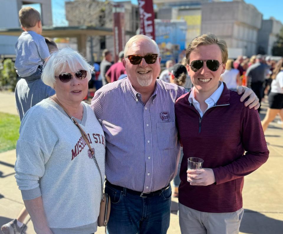 Jay Wasson, wife Retha, and Bradley Cooper at a Missouri State University football game.