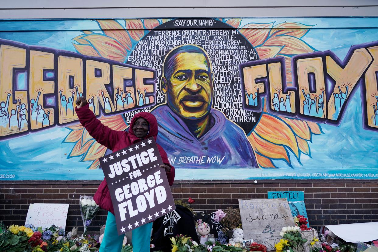 A person reacts near Cup Foods in Minneapolis after a guilty verdict was announced at the trial of former Minneapolis Police Officer Derek Chauvin for the 2020 death of George Floyd, Tuesday, April 20, 2021. 