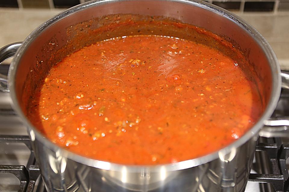 Gwendolyn Baker's sauce cooks on the stove of her Red Lion home. Baker volunteers for Lasagna Love where she makes and delivers two lasagnas a week for nearby needy families.