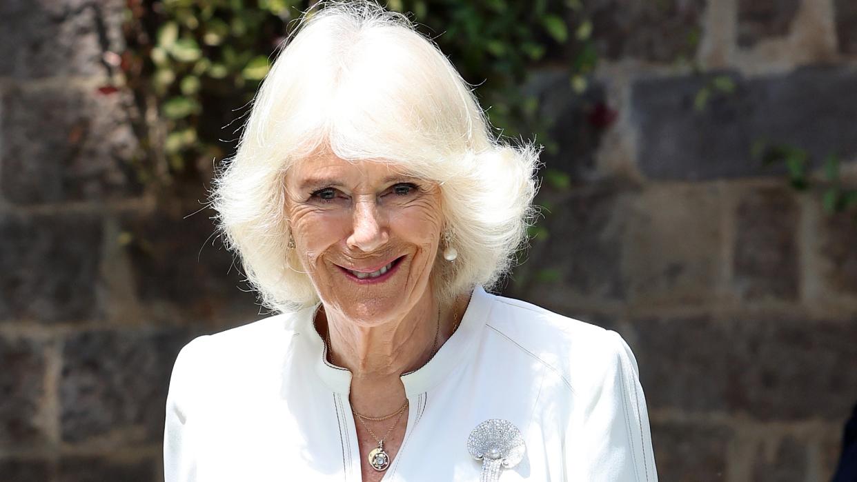  Queen Camilla's Scallop Shell Brooch seen as she visits Eastlands Library. 