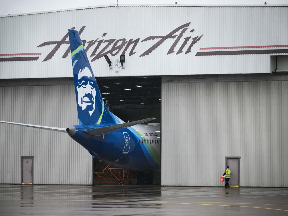 Alaska Airlines N704AL is seen grounded in a hangar at Portland International Airport on January 9, 2024 in Portland, Oregon. NTSB investigators are continuing their inspection on the Alaska Airlines N704AL Boeing 737 MAX 9 aircraft following a midair fuselage blowout on Friday, January 5. None of the 171 passengers and six crew members were seriously injured.