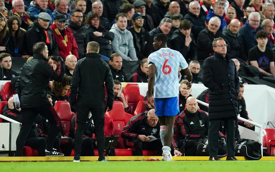 Paul Pogba went off injured at Anfield (PA Wire)