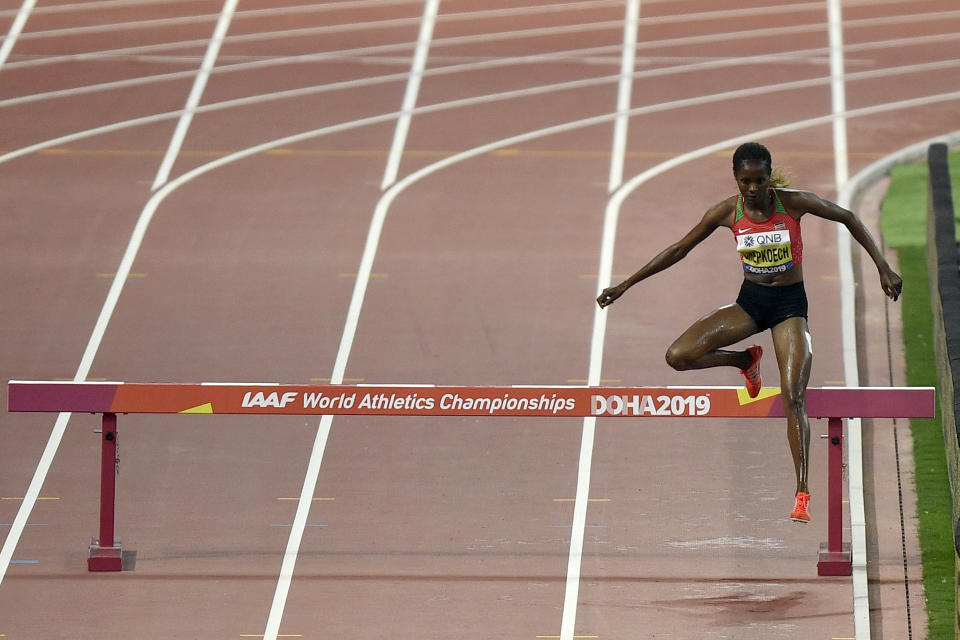 Beatrice Chepkoech, of Kenya,competes in the women's 3000 meter steeplechase final during the World Athletics Championships in Doha, Qatar, Monday, Sept. 30, 2019. (AP Photo/Martin Meissner)