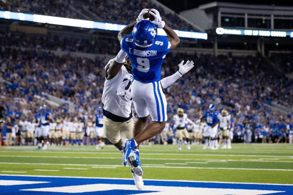 Kentucky wide receiver Tayvion Robinson (9) hauled in a 22-yard touchdown pass from Devin Leary eight seconds before halftime in UK’s 35-3 victory over Akron last week. Robinson, a super-senior slot receiver, leads the Wildcats in receptions (14), receiving yards (260) and receiving TDs (three).