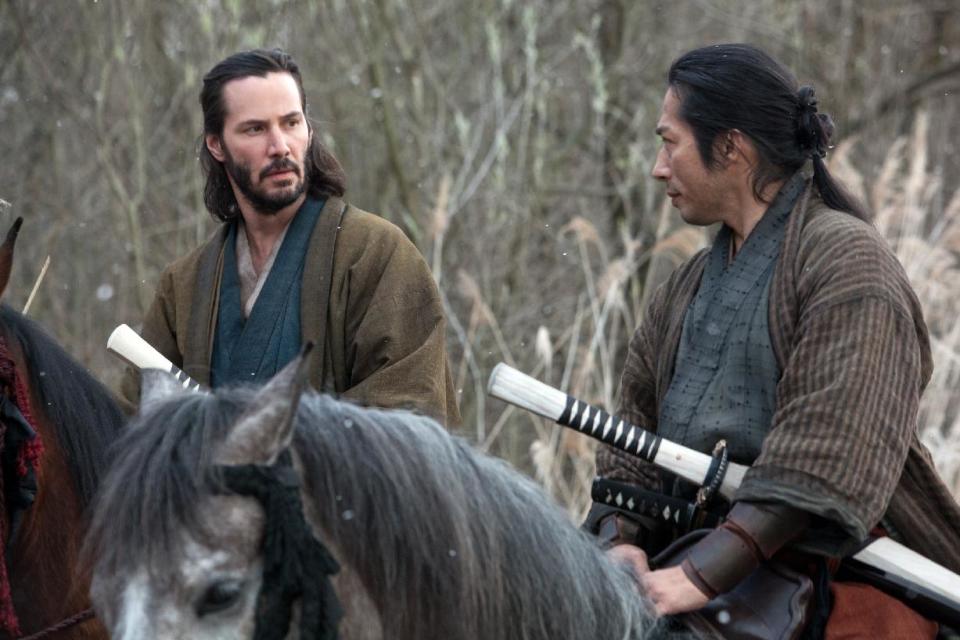 This image released by Universal Pictures shows Keanu Reeves, left, and Hiroyuki Sanada in a scene from "47 Ronin." (AP Photo/Universal Pictures, Frank Connor)