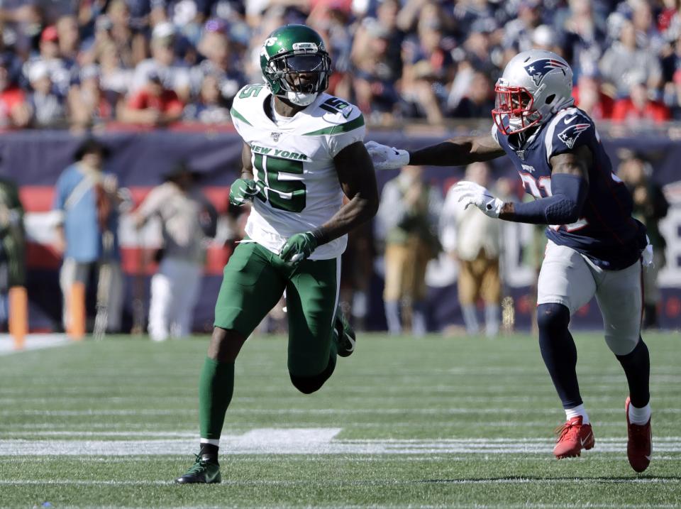 FILE - In this Sunday, Sept. 22, 2019 file photo, New York Jets wide receiver Josh Bellamy runs a pass route as New England Patriots defensive back Jonathan Jones (31) gives chase in the second half of an NFL football game in Foxborough, Mass. A person with direct knowledge of the decision says the New York Jets are placing wide receivers Quincy Enunwa and Josh Bellamy on the reserve/physically unable to perform list. The moves Tuesday, May 5, 2020 effectively end each of the player's seasons with the Jets, four months before the season opener is scheduled. (AP Photo/Steven Senne, File)