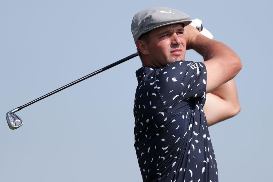 Bryson DeChambeau hitting a ball during the British Open. The golf star blamed his poor performance on his driver.