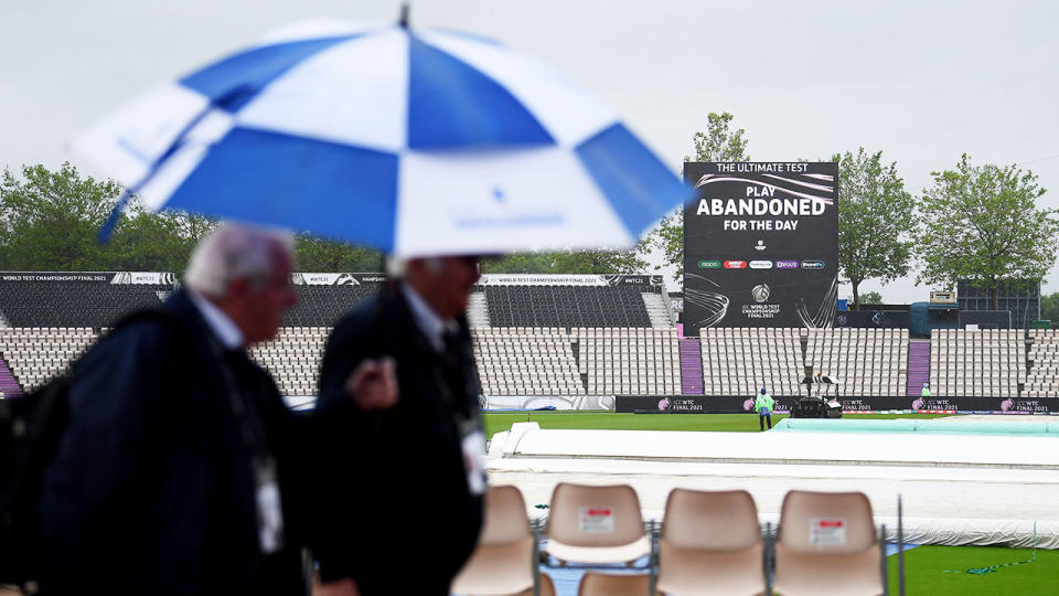 Spectators, pictured here leaving the ground after play was abandoned.