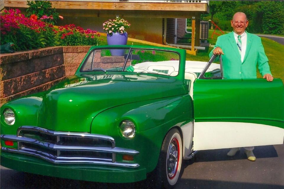 This 1950 Plymouth owned by car enthusiast DeWitt Powell was featured on a family Christmas card.