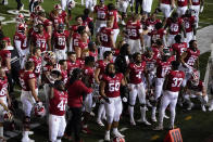 Indiana players celebrate after defeating Penn State in overtime of an NCAA college football game, Saturday, Oct. 24, 2020, in Bloomington, Ind. Indiana won 36-35 in overtime. (AP Photo/Darron Cummings)