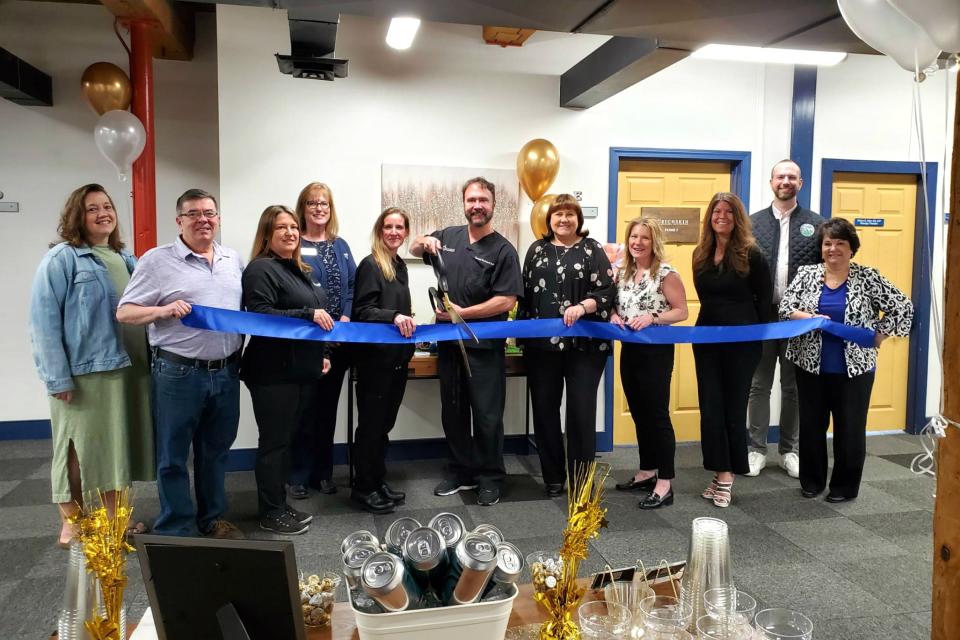 From left to right are Chamber board members Amy Brown of Yankee Electric & Co., David Stevens of Century 21 Northeast, Jenn Marsh, Deputy Director of Rochester Economic Development, Chamber board member Sharla Rollins of First Seacoast Bank, Gina McMorris-Head Nurse Injector at RichSkin, RichSkin owner Dan Richard cutting the ribbon, Mary Henderson of Bank of New Hampshire, Chamber Chair of the Board Kerrie Landry of COGEBI, Melissa Lesniak, Keller Williams Coastal Realty, Matt Wyatt-Rochester’s Public Information & Community Engagement Manager, and Chamber President Laura Ring.