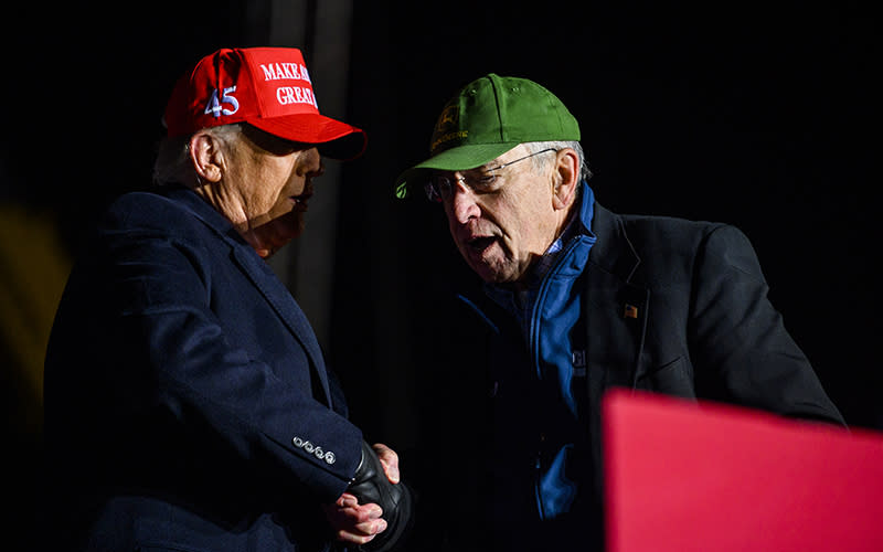 Sen. Charles Grassley (R-Iowa), right, joins former President Trump during a campaign event