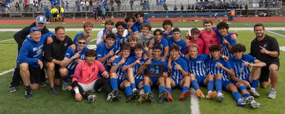 Holmdel celebrate with their trophy. Holmdel Boys Soccer defeats Manasquan in NJSIAA Central Group 2 Championship game in Holmdel, NJ on November 4, 2023.