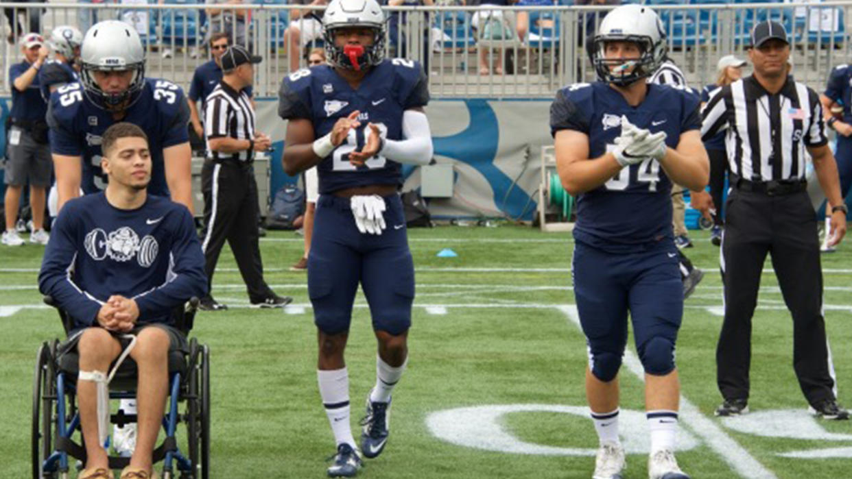 Georgetown senior Ty Williams was paralyzed in a collision with an opponent while trying to knock down a pass during the 2015 season (AP Photo).