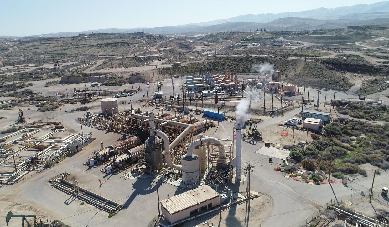 OIl and gas infrastructure stretches for miles across the landscape in McKittrick, Ca., February 20, 2020.