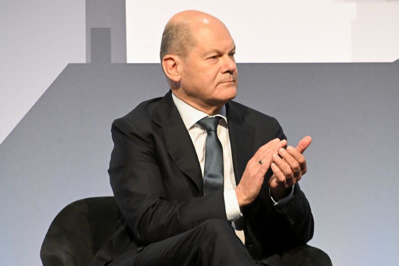 German Chancellor Scholz addresses the Association of German Cities and Towns, in Cologne