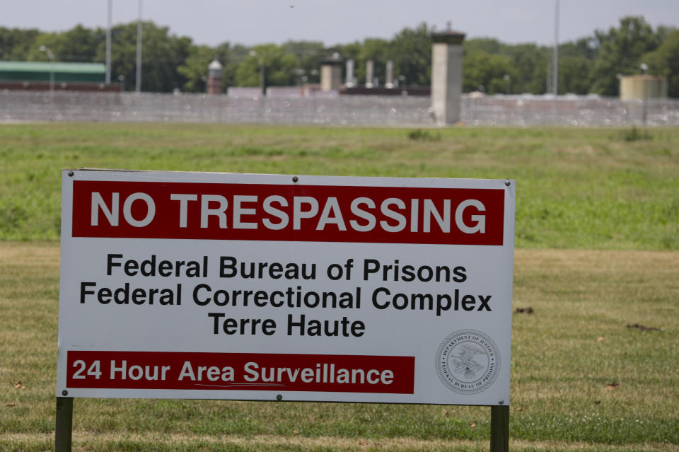 A No Trespassing sign stands in front of the federal prison complex in Terre Haute, Ind. Friday, July 17, 2020. A judge in Washington is halting for now the government’s planned Friday execution at the federal prison in Terre Haute, Indiana of Keith Dwayne Nelson who was convicted of kidnapping, raping and murdering at 10-year-old Kansas girl. (AP Photo/Michael Conroy)