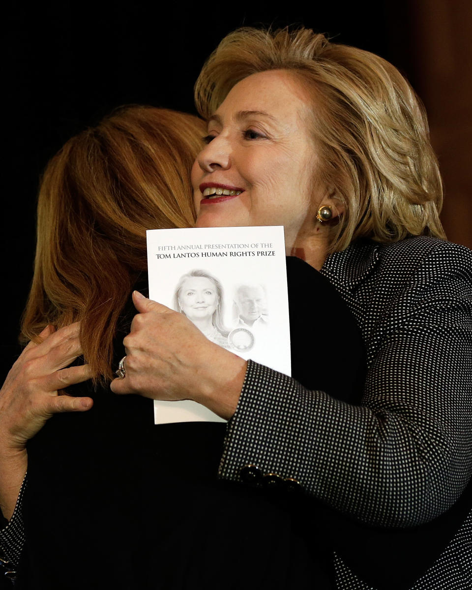 WASHINGTON, DC - DECEMBER 06:  Former U.S. Secretary of State Hillary Clinton (R) embraces Katrina Lantos Swett (L), President of the Lantos Foundation, before Clinton was presented the 2013 Tom Lantos Human Rights Prize December 6, 2013 in Washington, DC. Clinton received the award for her work in the areas of women's rights and internet freedom.  (Photo by Win McNamee/Getty Images)