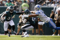 Detroit Lions' Miles Killebrew, right, tackles Philadelphia Eagles' Miles Sanders during the first half of an NFL football game, Sunday, Sept. 22, 2019, in Philadelphia. (AP Photo/Matt Rourke)