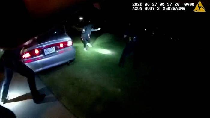 Walker exits his vehicle and runs before he is shot to death.