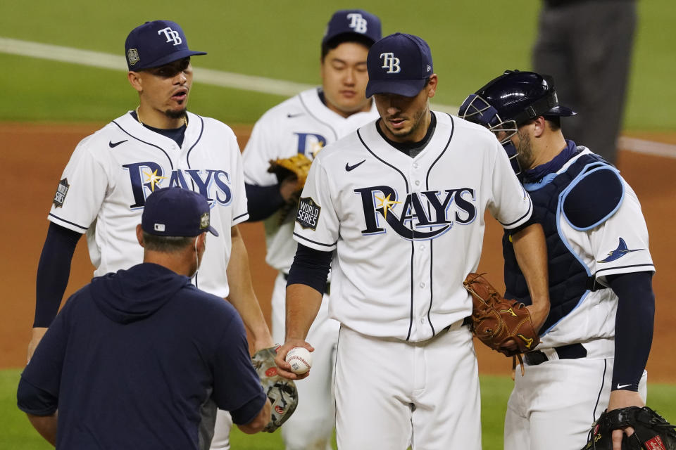 Tampa Bay Rays starting pitcher Charlie Morton leaves the game against the Los Angeles Dodgers during the fifth inning in Game 3 of the baseball World Series Friday, Oct. 23, 2020, in Arlington, Texas. (AP Photo/Tony Gutierrez)