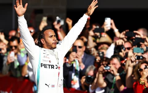 Lewis Hamilton celebrates his sixth world title - Credit: Getty Images