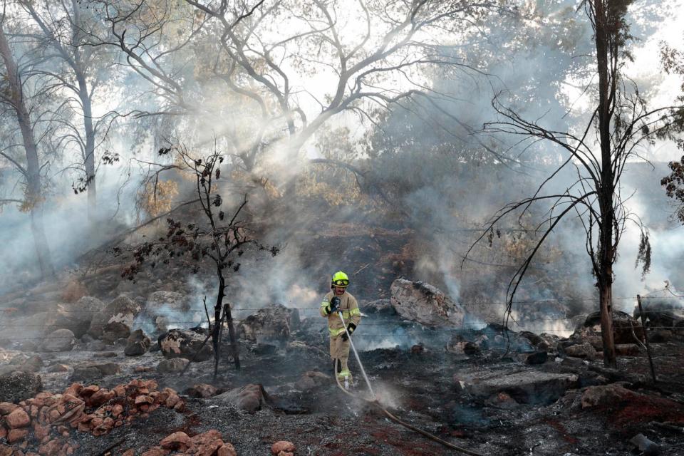 PHOTO: A firefighter douses a fire that broke out after a rocket strike fired from Lebanon, on July 4, 2024, in Northern Israel. (Amir Levy/Getty Images)