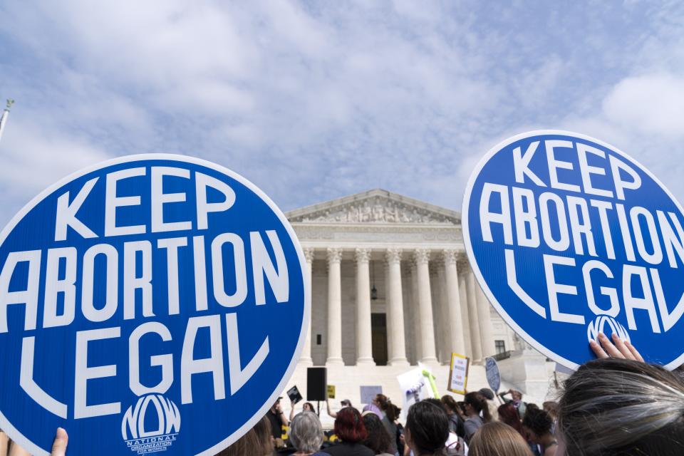 Demonstrators protest outside of the Supreme Court Tuesday, May 3, 2022 in Washington. A draft opinion suggests the U.S. Supreme Court could be poised to overturn the landmark 1973 Roe v. Wade case that legalized abortion nationwide, according to a Politico report released Monday. Whatever the outcome, the Politico report represents an extremely rare breach of the court's secretive deliberation process, and on a case of surpassing importance. (AP Photo/Jose Luis Magana)