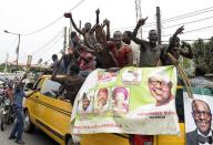 Supporters of President-elect Muhammadu Buhari celebrate his victory in Lagos on April 1, 2015