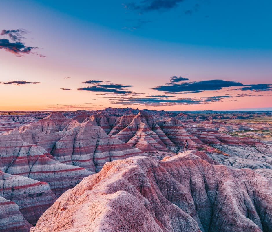 <p>Courtesy of Trafalgar</p><p>You won’t find many crowds in South Dakota’s Badlands National Park, North Dakota’s Theodore Roosevelt National Park, and all those hauntingly beautiful spots in between—where vast prairie collides with stark, desiccated canyons striated in otherworldly color. Signing up for a tour here will provide you with a whole new appreciation for this oft-overlooked swath of our country, from its utterly serene present to its complicated past.</p><p>Rock spires, steep valleys, and wildlife such as bighorn sheep and prairie dogs greet you in Badlands National Park. Timeless prairies and more overachieving geology hides up in Theodore Roosevelt National Park’s North and South Units, once home to the nation’s 26th president during a formative cowboy phase. Some meals are included, and lodging is at comfortable hotels. For off-the-beaten-path serenity seekers, these tours are as low key and unique as they sound. </p><p>[From $2,925 per person for nine days; <a href="https://www.trafalgar.com/en-us/tours/national-parks-and-native-trails-of-the-dakotas?optionId=2142" rel="nofollow noopener" target="_blank" data-ylk="slk:trafalgar.com;elm:context_link;itc:0;sec:content-canvas" class="link ">trafalgar.com</a>] </p>