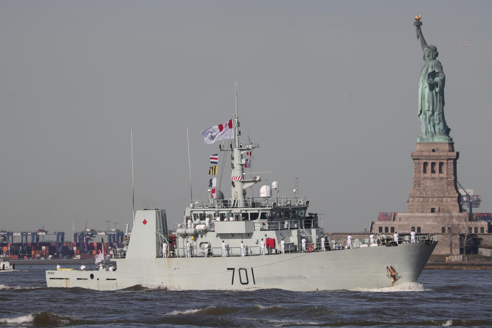 The HMCS Glace Bay Canadian Navy coastal defense vessel makes way past the Statue of Liberty in New York Harbor marking the beginning of Fleet Week  in New York in 2019. (Shannon Stapleton/Reuters)