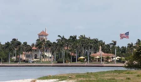 The Mar-a-Lago estate owned by U.S. President Donald Trump is shown with a U.S. flag in Palm Beach, Florida, U.S., April 5, 2017. Trump will meet with President of China Xi Jinping on April 6 and 7 at the estate. REUTERS/Joe Skipper