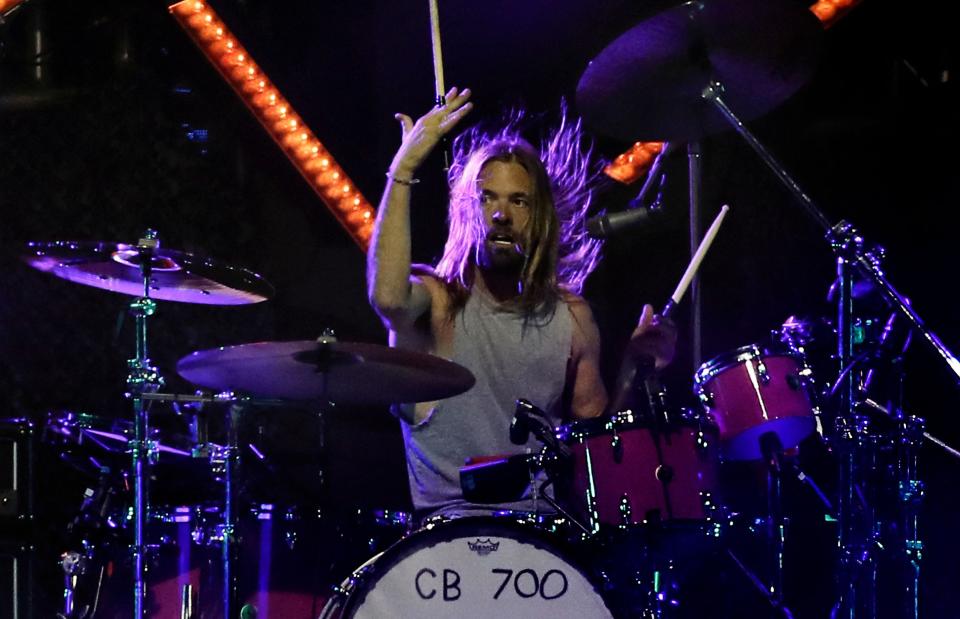 Picture taken on March 18, 2022 of Foo Fighters' drummer Taylor Hawkins on stage at the Lollapalooza 2022 music festival in Santiago. - Hawkins, 50, of the multi-Grammy award-winning rock group the Foo Fighters has died while on tour in Bogota, Colombia, his bandmates said in a statement on March 25, 2022.