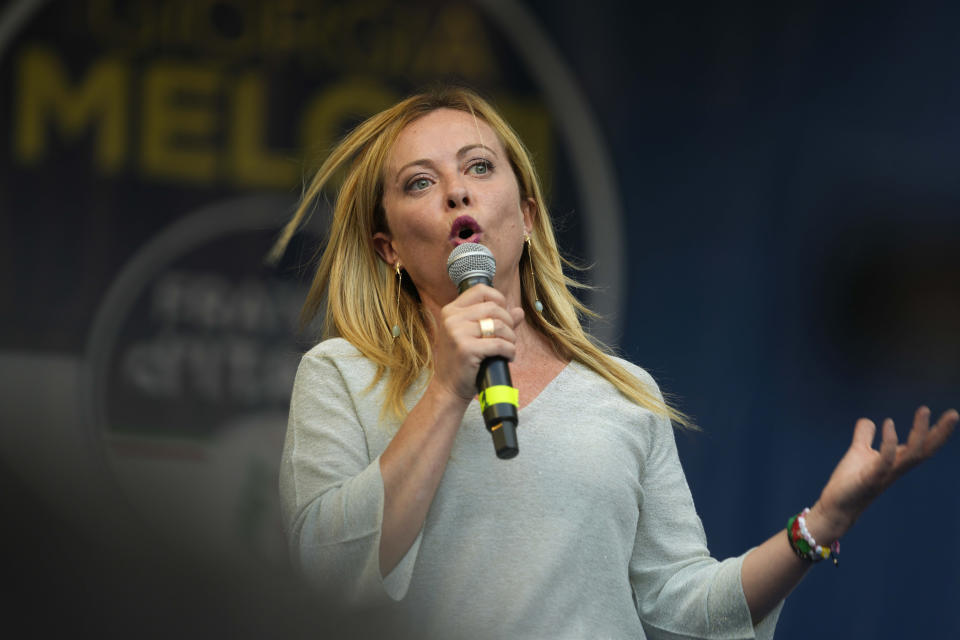 FILE - Right-wing party Brothers of Italy's leader Giorgia Meloni addresses a rally as she starts her political campaign ahead of Sept. 25 general elections, in Ancona, Italy, Tuesday, Aug. 23, 2022. Riding high in voter opinion surveys for weeks now, Meloni might become Italy's first far-right premier since the end of World War II. Italy will elect a new Parliament on Sept. 25. (AP Photo/Domenico Stinellis, File)