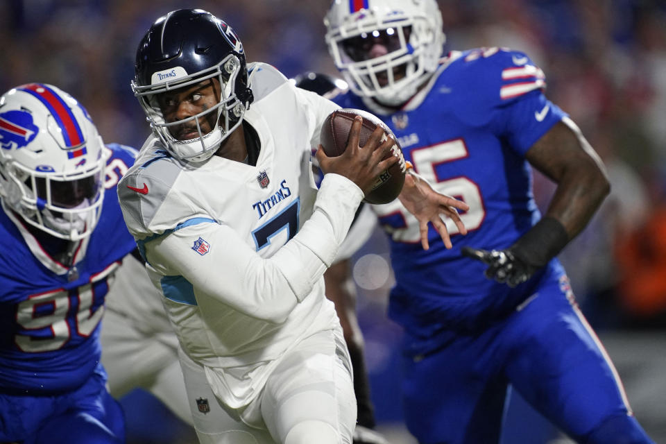 Sep 19, 2022; Orchard Park, New York, USA; Tennessee Titans quarterback Malik Willis (7) scrambles out of the pocket during the third quarter at Highmark Stadium. Mandatory Credit: George Walker IV -USA TODAY Sports