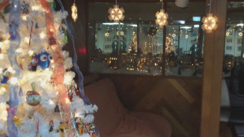 Couple packs home with 90 Christmas trees adorned with thousands of ornaments