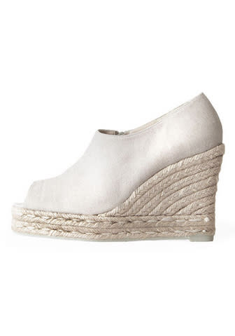 CastaÃ±er peep-toe espadrille wedges, $263, at La Garconne