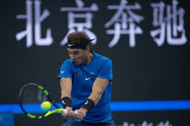 Rafael Nadal of Spain hits a return during his match against Lucas Pouille of France at the China Open on October 3, 2017