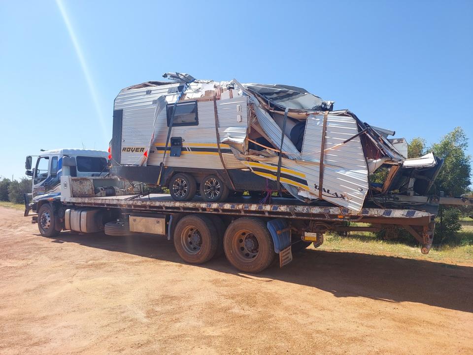 Crumpled caravan on the back of a truck in western Australia. 