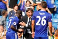 Football Soccer Britain - Chelsea v Burnley - Premier League - Stamford Bridge - 27/8/16 Chelsea manager Antonio Conte celebrates with N'Golo Kante and John Terry at full time Reuters / Eddie Keogh Livepic