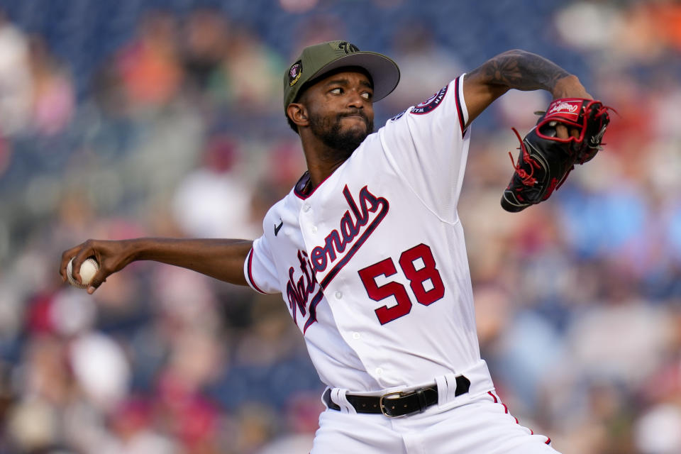 Washington Nationals relief pitcher Carl Edwards Jr., throws during the seventh inning of a baseball game against the Detroit Tigers at Nationals Park, Saturday, May 20, 2023, in Washington. (AP Photo/Alex Brandon)