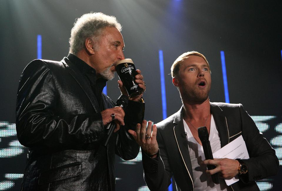 Ronan Keating (right) on stage with Tom Jones (left) at the 250th Anniversary of Guinness Concert, at the Storehouse, St James Gate Brewery, Dublin   (Photo by Niall Carson/PA Images via Getty Images)