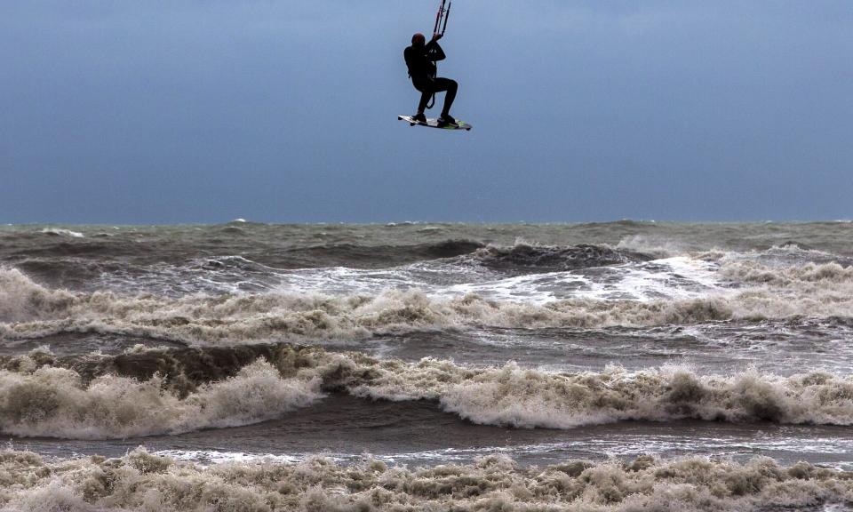 A kite-surfer kites the brave sea. Source: AAP/Stock image