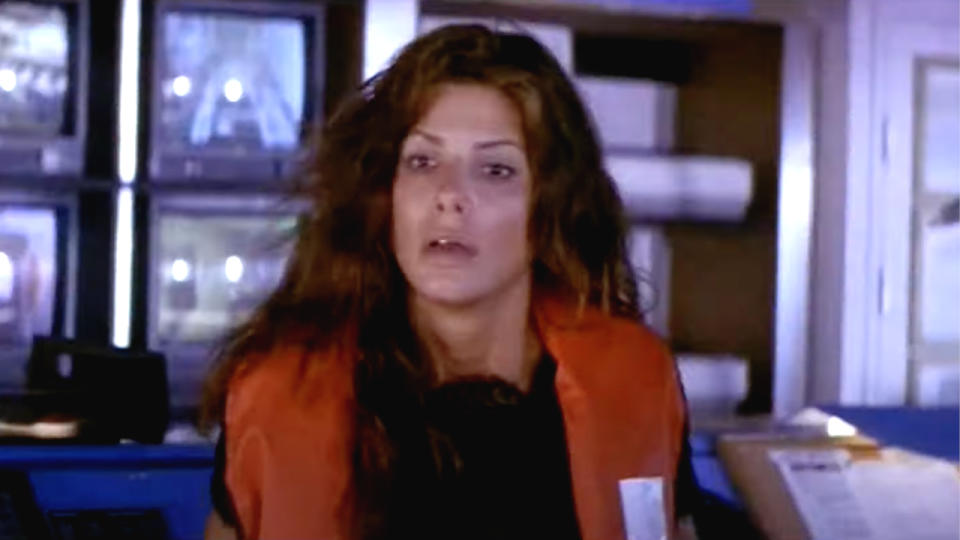 Sandra Bullock looking frustrated while wearing a life vest in Speed 2: Cruise Control.