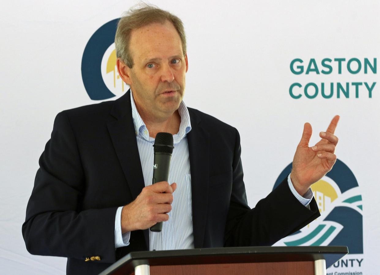 Donny Hicks talks during Apple Creek Corporate Center’s Grand Opening Celebration held Tuesday morning, May 10, 2022, in Dallas.