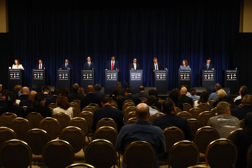 Industry, CA, Wednesday, October 2023 - Los Angeles District Attorney candidates forum at Pacific Palms Resort. Left to right are Debra Archuleta, Jeff Chemerinsky, Jonathan Hatami, Nathan Hochman, John McKinney, David S. Milton, Craig Mitchell, Maria Ramirez and Eric Siddall. (Robert Gauthier/Los Angeles Times)