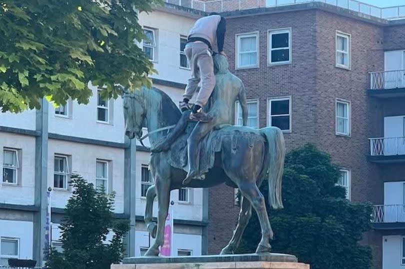 A man was seen climbing on Lady Godiva on Broadgate in Coventry